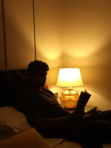 Warm lamplight and a quiet moment